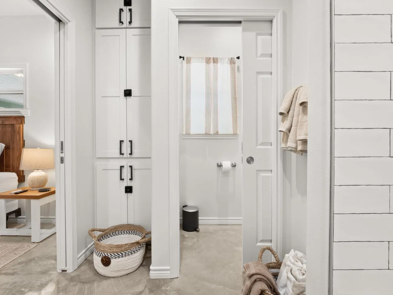 The toilet and shower area of the master bathroom are separate.