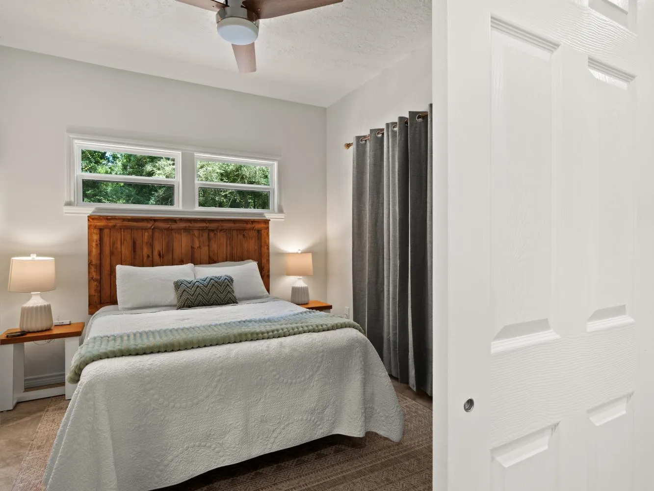 Here is bedroom 2 which has a queen size bed.