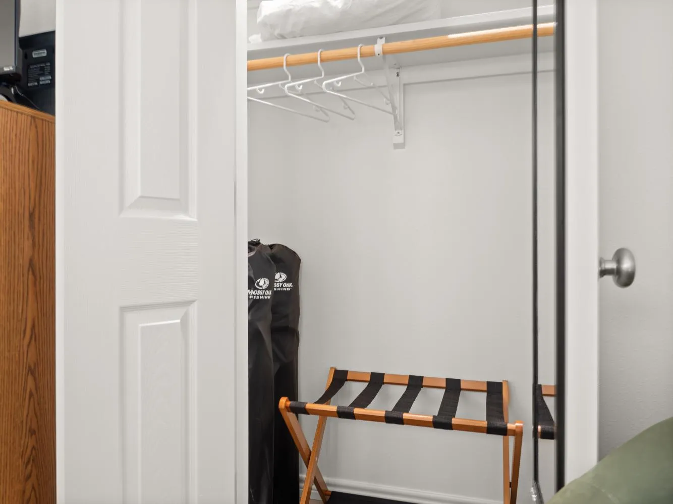 The master bedroom has  a small closet in the corner.