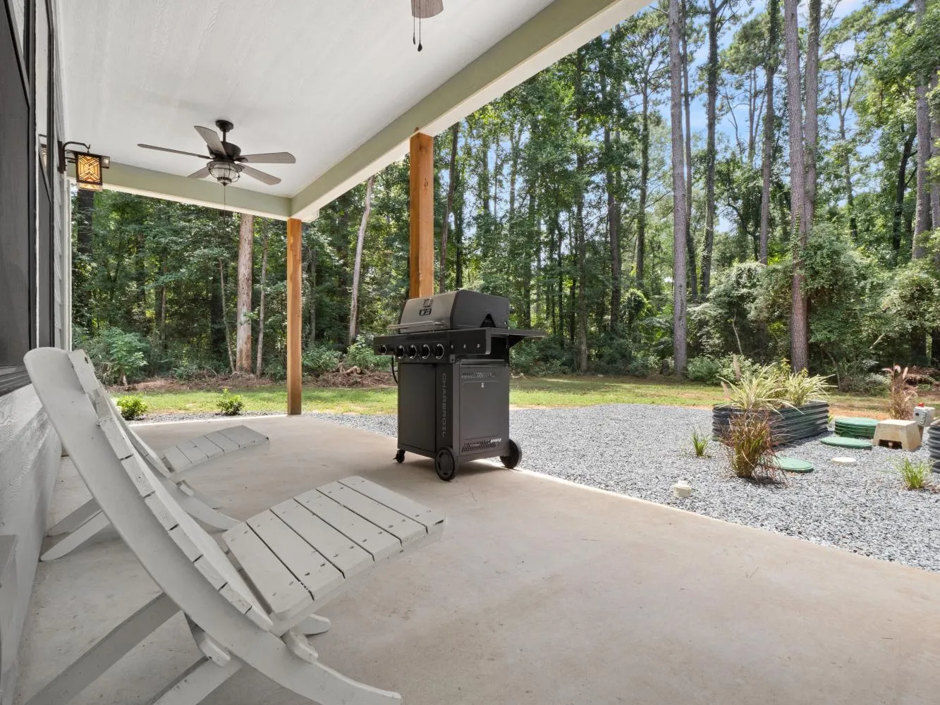 The back porch has some scenic view and a gas grill.