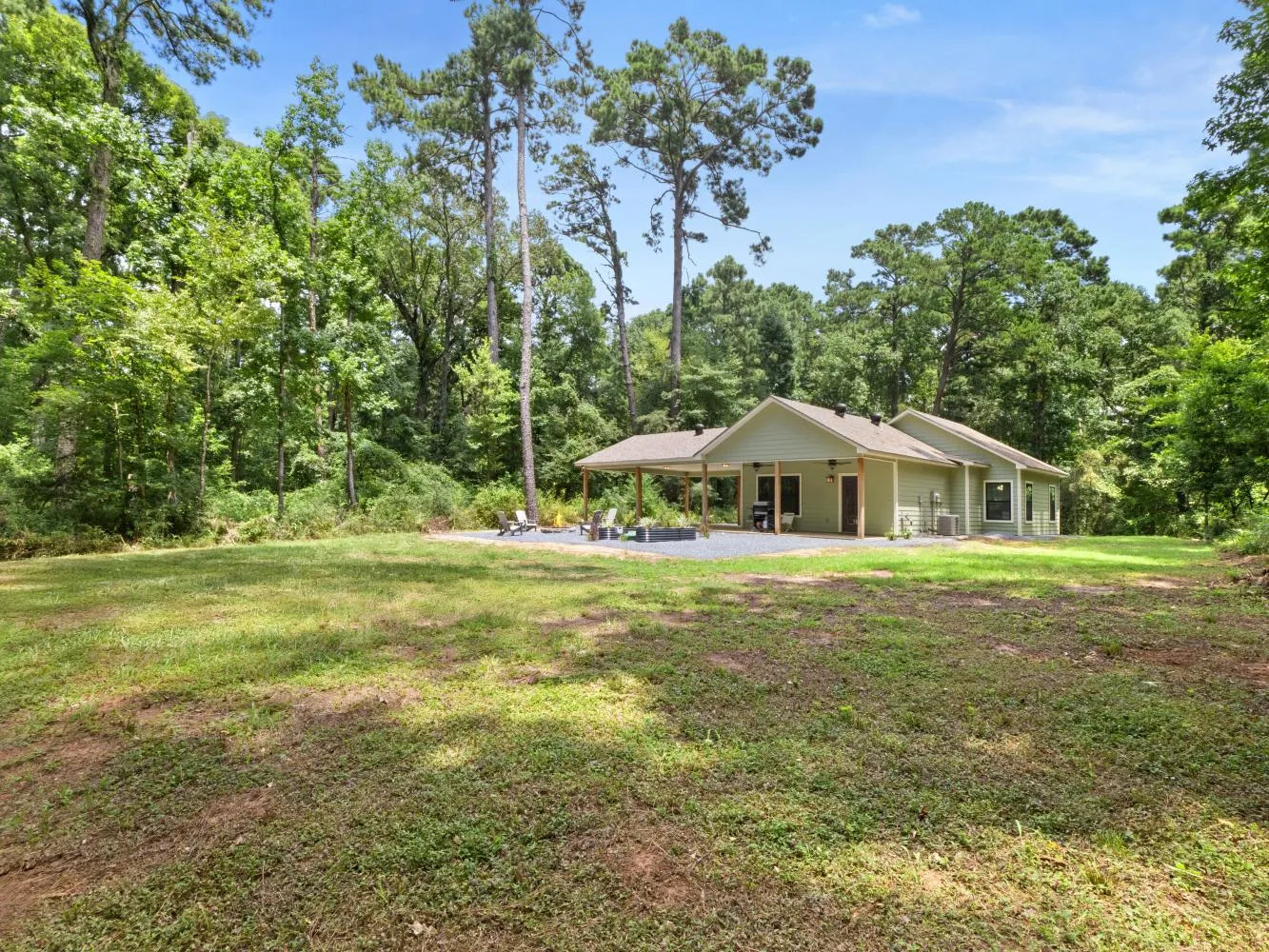 The back yard has plenty of space to walk around.